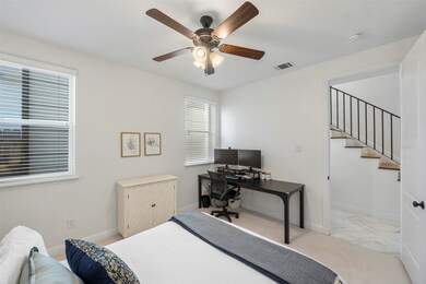 This bright and versatile bedroom offers plenty of