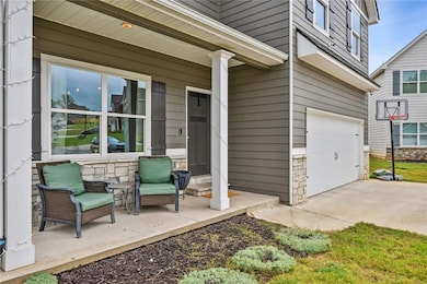 View of patio featuring a garage
