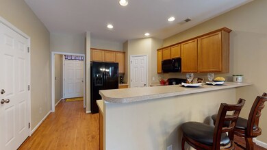 Kitchen Out to Garage & Foyer