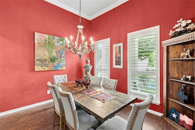 Dining space with a chandelier, plenty of natural