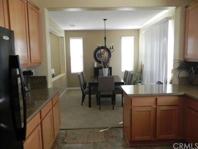 View of dining room from kitchen