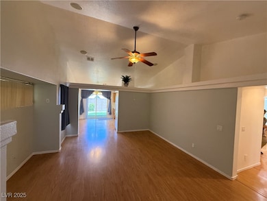 Empty room featuring wood finished floors, a ceili