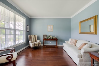 The formal living room could also be an office or study and includes hardwood floors, a transom window and crown molding
