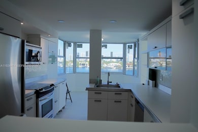 The Reef Club unit 5G BOAT SLIP INCLUDE, North Miami Beach, FL 33160 - photo 2