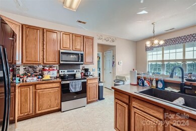 4223 Kiser Woods Dr SW, Concord, NC 28025 - photo 5