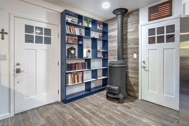 The Great Room Features Built-In Bookcases, Wood-B