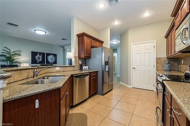 12858 Carrington Cir unit 8-101, Naples, FL 34105 - photo 4
