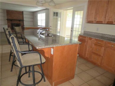 Kitchen. View from the garage entrance, note the c