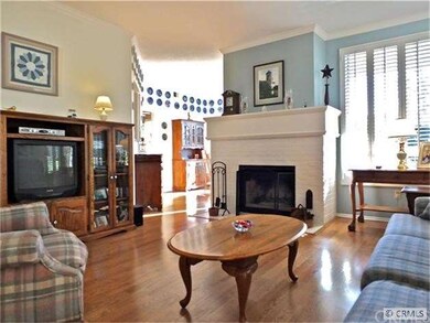 Large Living room with plantation shutters and  lo