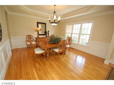 Dining Room - Tray ceilings and hardwood floors!