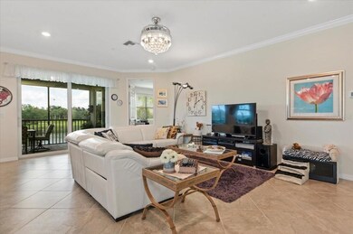 Ample walking space around furnishings; beautiful crystal fandalier for function and beauty.