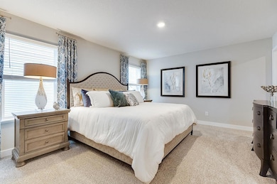 Bedroom fits king-size furniture. Photo of Model Home. Options and colors may vary.