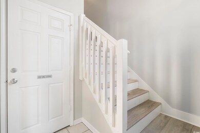 Stairway featuring baseboards