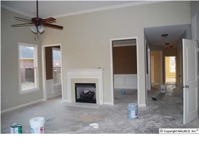 Family room with gas fireplace and French doors out to front porch.