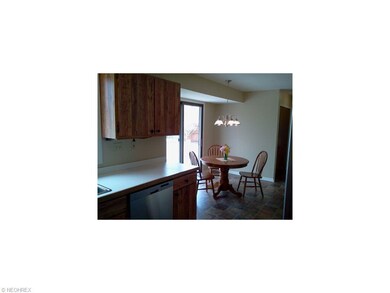 Eat in Kitchen and patio door to the maintenance free deck.