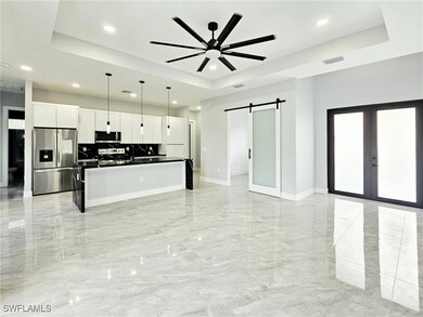 Kitchen with appliances with stainless steel finis