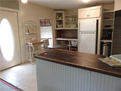 Kitchen with new tile floor.