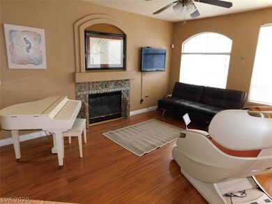 Spacious living room with gas fireplace, vaulted c