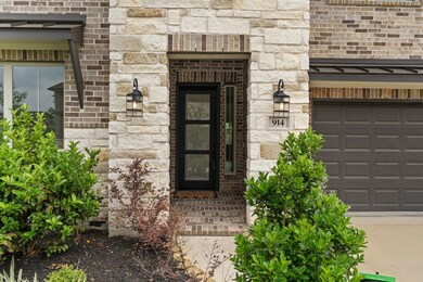This photo showcases a modern home entrance with a
