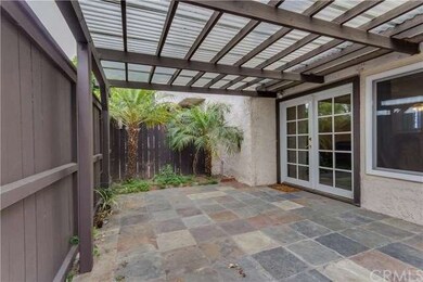 Spacious patio area with slate flooring for easy m