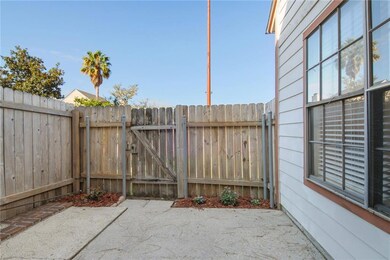 Private fenced patio. Short distance to tennis court + pool.