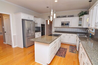 The kitchen comes equipped with stainless steel ap