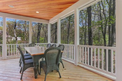 Screened porch dining area