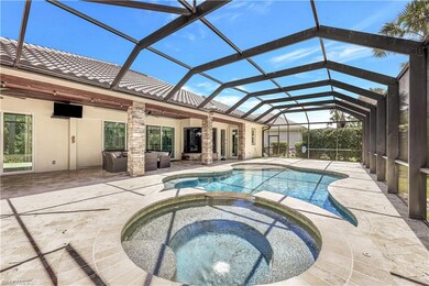 View of pool featuring a patio, screen enclosure, 