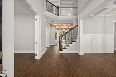 Two story entrance foyer is spacious enough to furnish and decorate for the holidays!