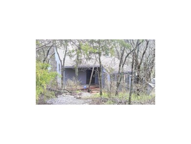 Enchanting cottage nestled among the trees along t