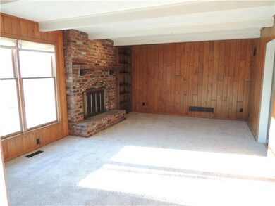 1st Floor Family Room with Brick Fireplace and Bui