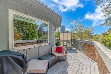 Wooden terrace with a grill