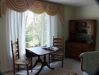 Living Room. Large window w/ view of  yard.