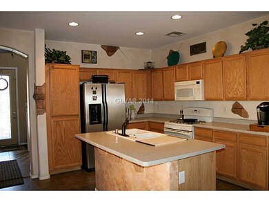 Property Photo. BRIGHT OPEN KITCHEN FEATURES AN IS