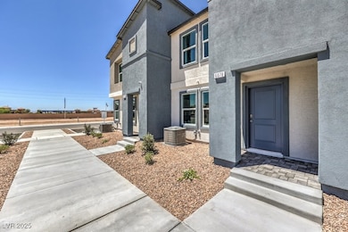 Property entrance with stucco siding