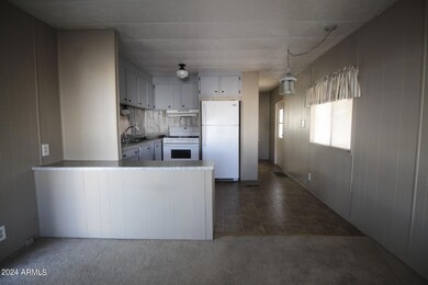 View into kitchen from living area