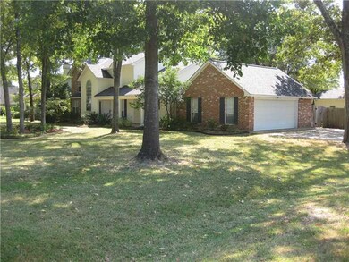 Facade/Exterior Front. Side entry two car garage.