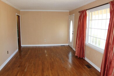 Formal Living  Room w/ Hardwood flooring and large picture window