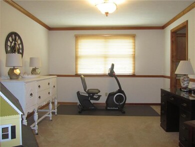 Formal Dining Room with crown molding & chair rail