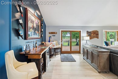 This light-filled home features over 2,100 square feet of living space with raised ceilings and abundant natural light throughout.