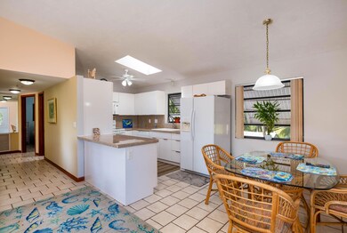 Open to the kitchen and dining area