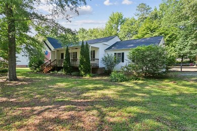 Ranch-style home featuring a front yard