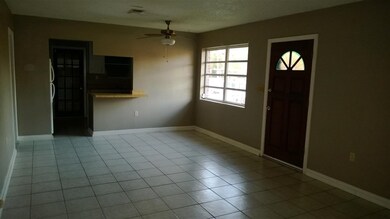 Living/Dining area looking into kitchen