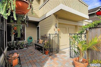 Mediterranean paver patio in front and rear. Gated