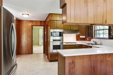 Kitchen with new Corian counters, stainless built