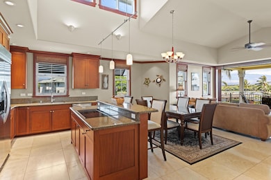 Wide view of living area and kitchen with great natural lighting throughout
