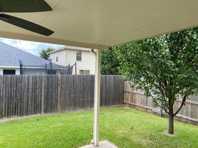 Back patio with metal cover