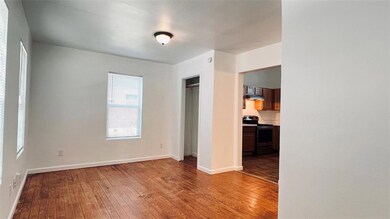 Unfurnished bedroom with light wood-style floors,