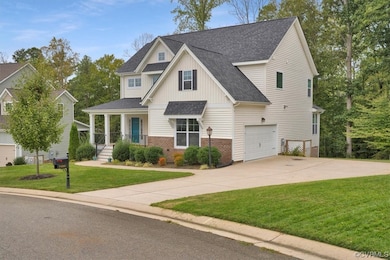 View of front of house featuring a front lawn and