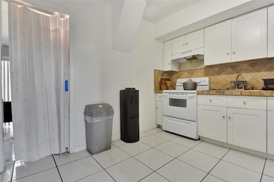 Kitchen into Bedroom off Kitchen